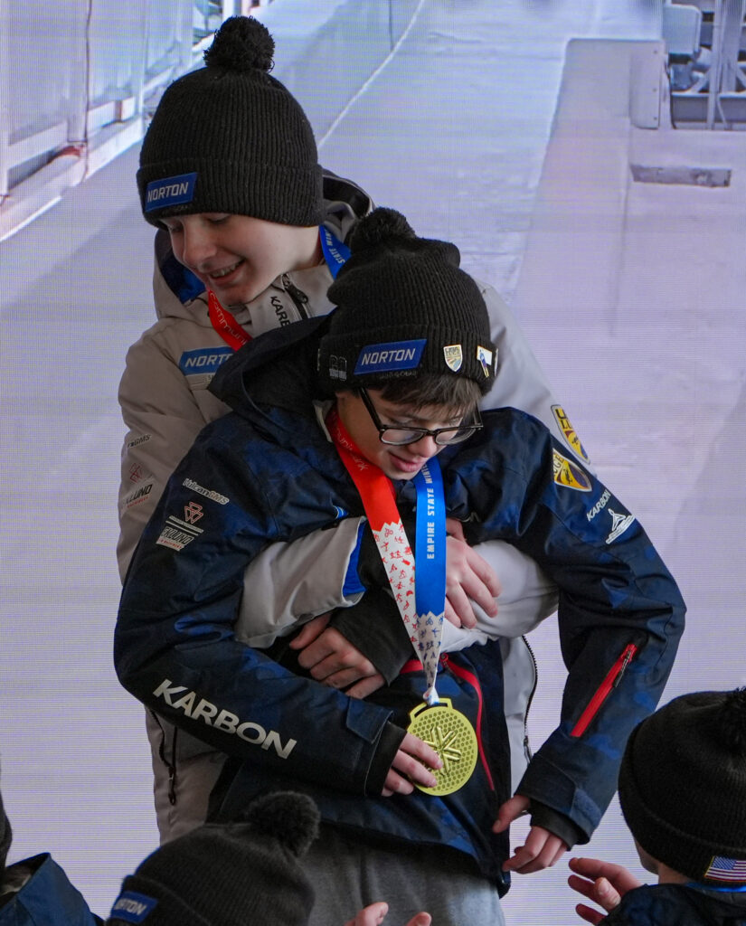 A group of athletes competing in athletic event sports