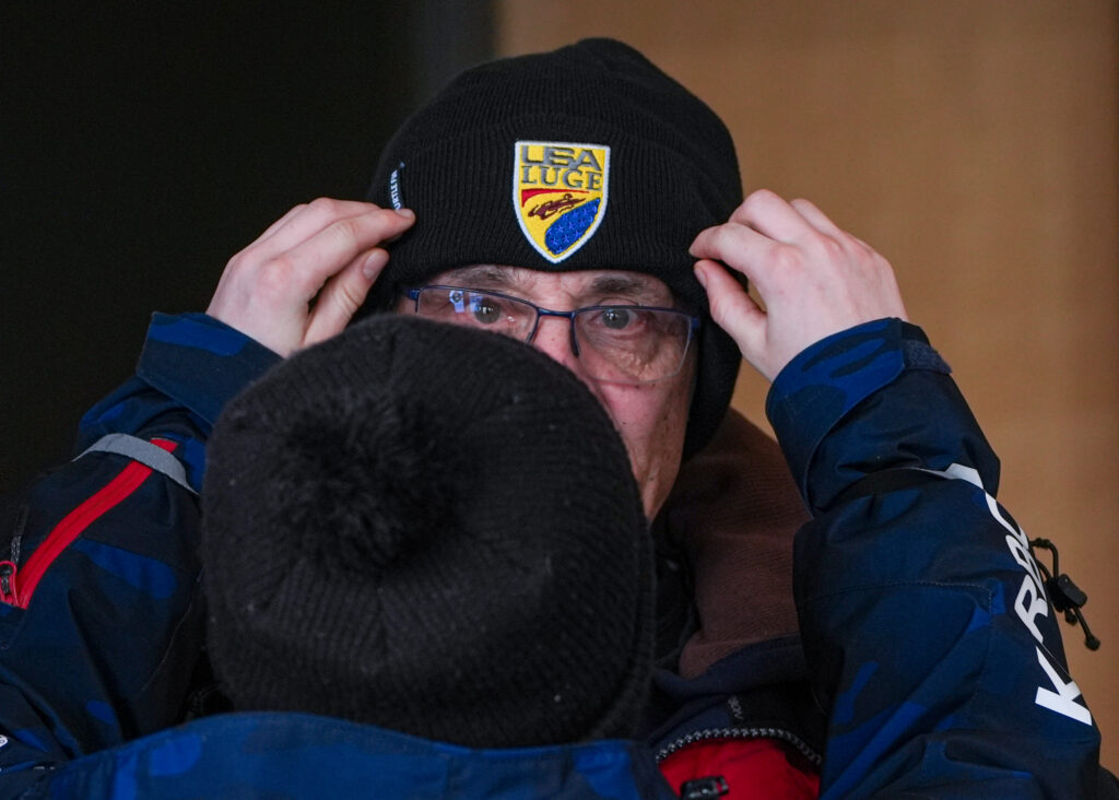 An athlete competing in athletic event sports