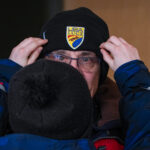 An athlete competing in athletic event sports