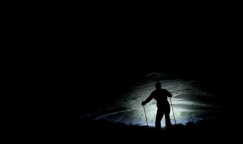 An athlete competing in athletic event sports