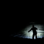 An athlete competing in athletic event sports