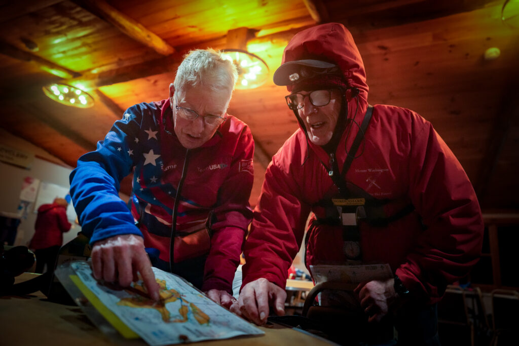 A group of athletes competing in athletic event sports