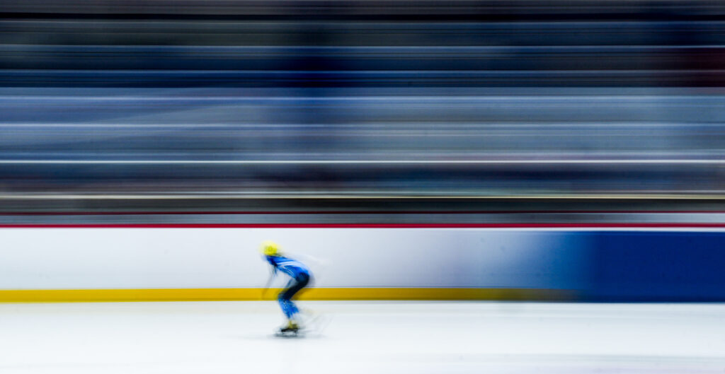 An athlete skating on the rink