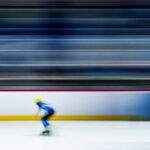 An athlete skating on the rink