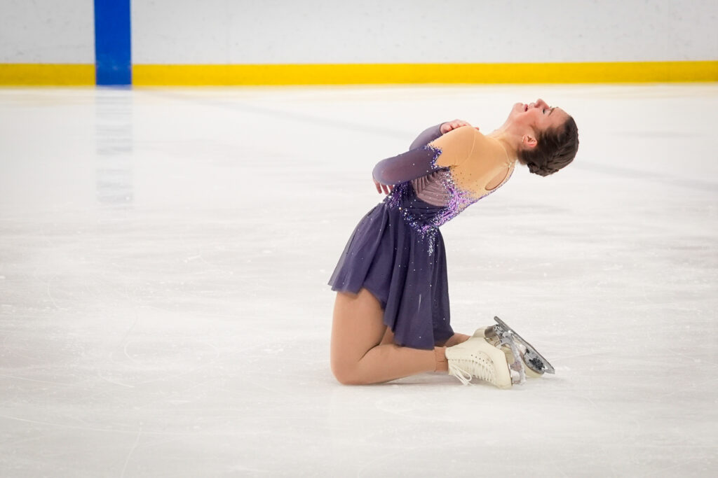 An athlete skating on the rink