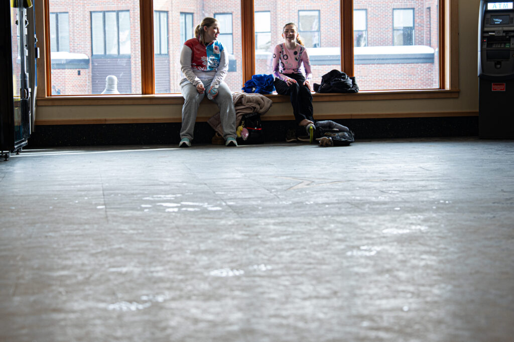 Two athletes competing in athletic event sports