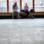 Two athletes competing in athletic event sports