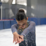 An athlete competing in athletic event sports