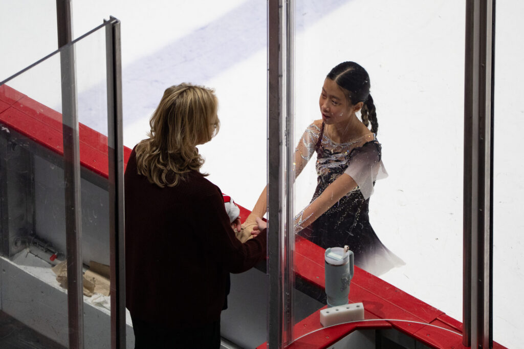 Two athletes competing in athletic event sports