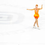 An athlete skating on the rink