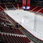 A group of athletes competing in athletic event sports