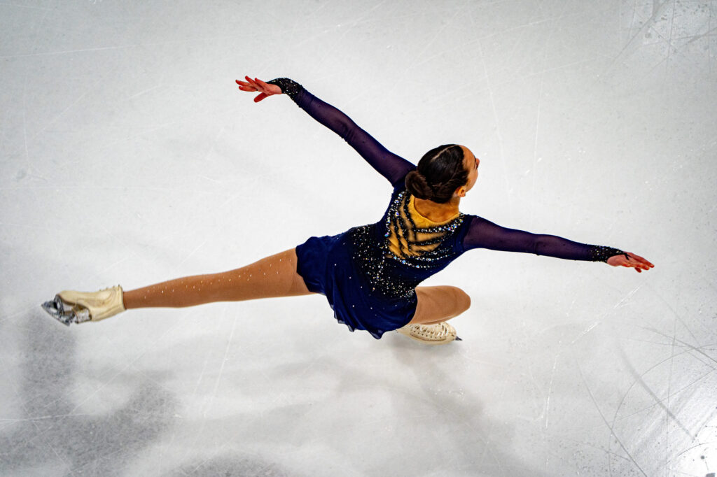 An athlete skating on the rink