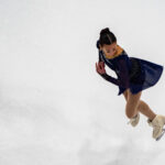 An athlete skating on the rink