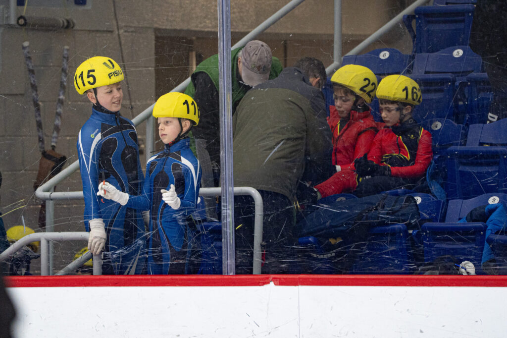 A group of athletes competing in athletic event sports with helmet