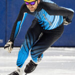 An athlete competing in athletic event sports with helmet