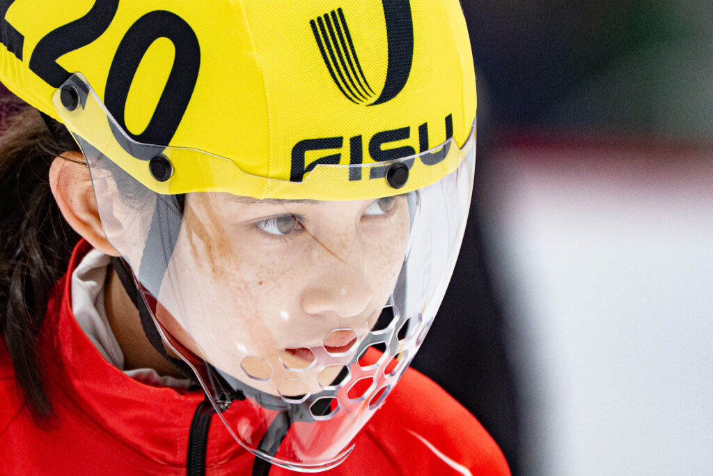 An athlete competing in athletic event sports with helmet