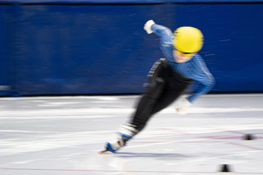 An athlete competing in athletic event sports with helmet
