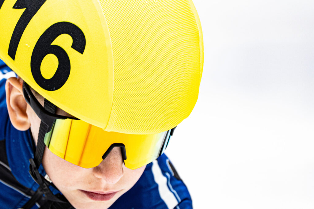 Athletes competing in athletic event sports with helmet