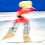 An athlete competing in athletic event sports in the snow