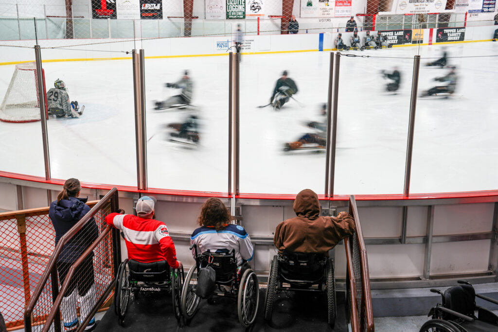 A group of athletes competing in athletic event sports with helmet