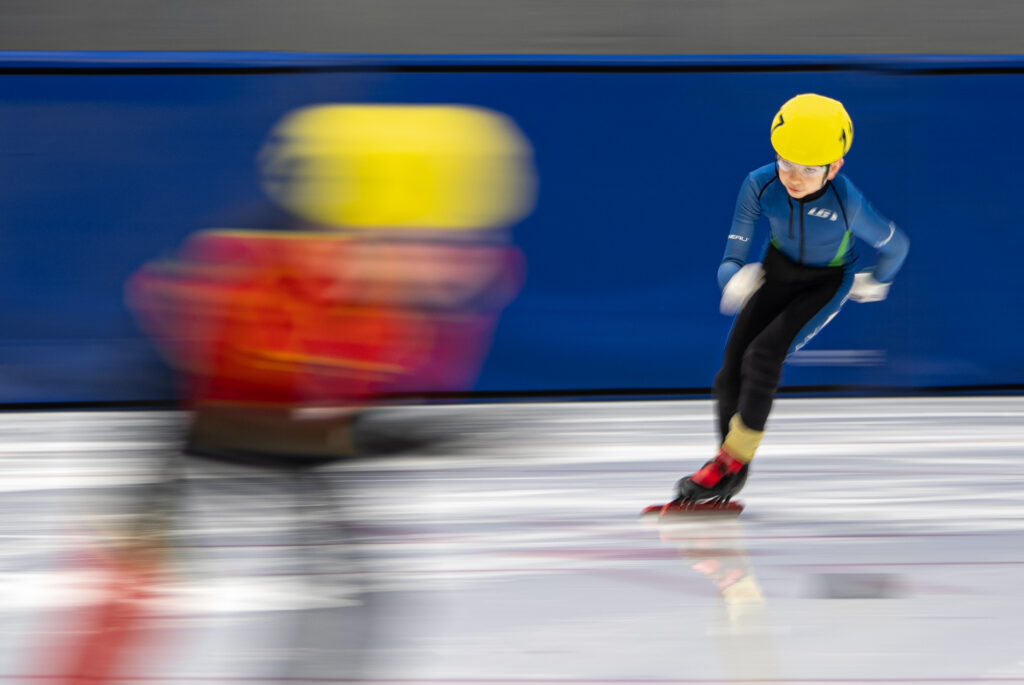 An athlete competing in athletic event sports with helmet