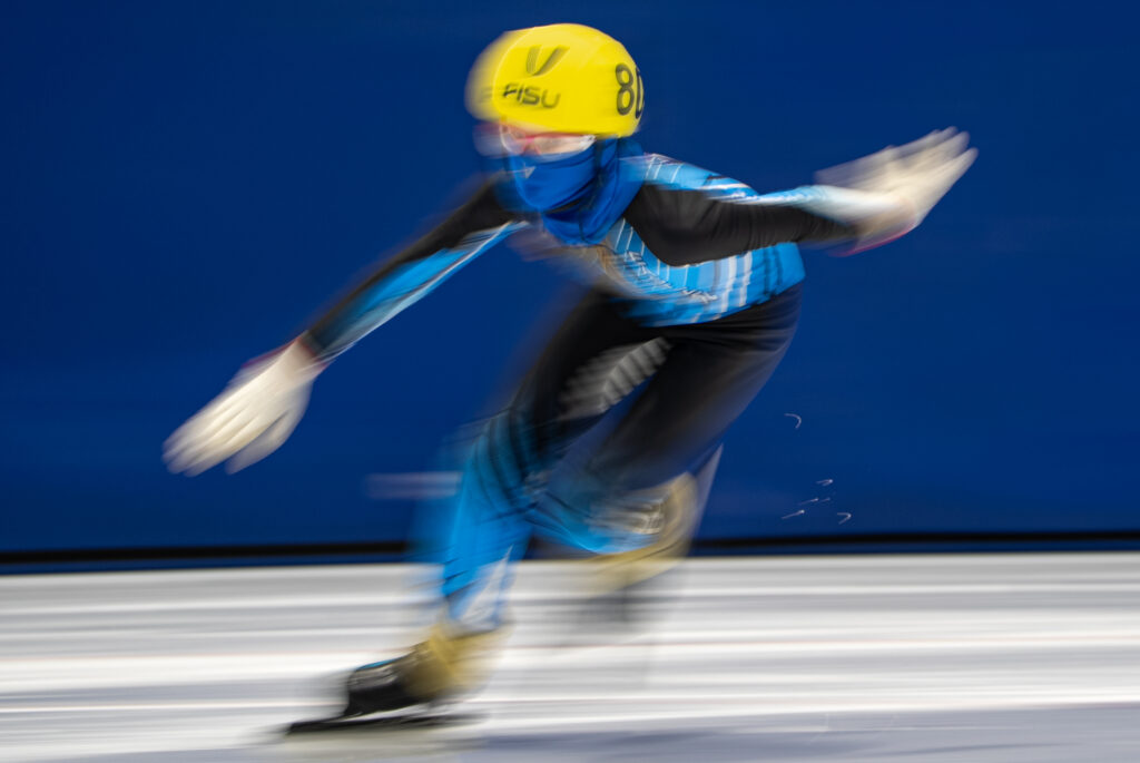 An athlete competing in athletic event sports with helmet