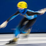 An athlete competing in athletic event sports with helmet