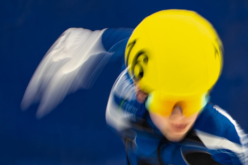 An athlete competing in athletic event sports with helmet