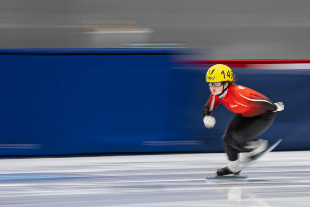 An athlete competing in athletic event sports with helmet