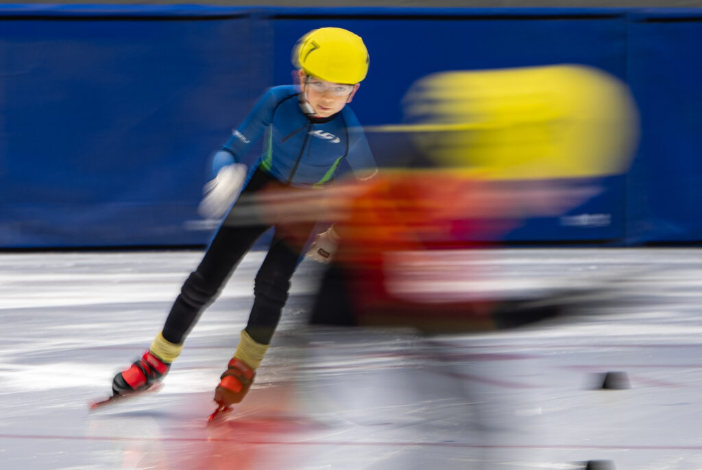 An athlete competing in athletic event sports with helmet