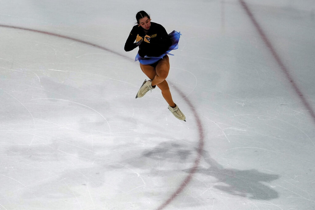 An athlete skating on the rink