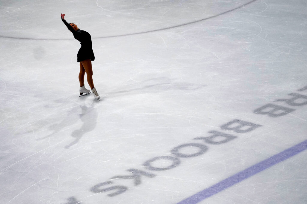 An athlete skating on the rink
