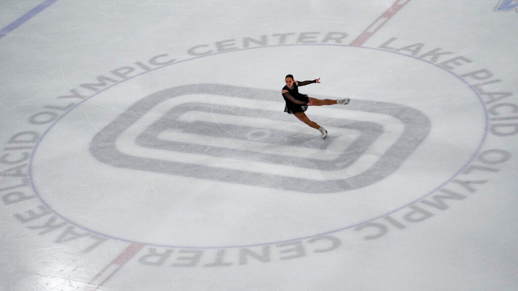 An athlete skating on the rink