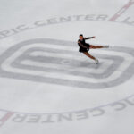An athlete skating on the rink