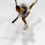 An athlete skating on the rink