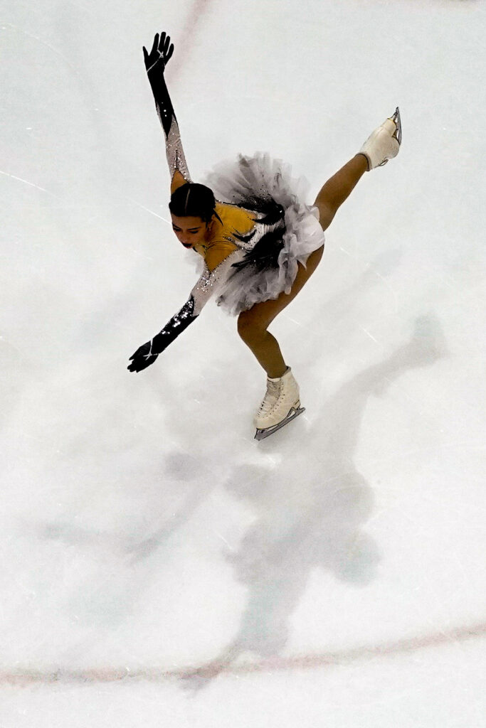 An athlete skating on the rink