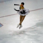 An athlete skating on the rink