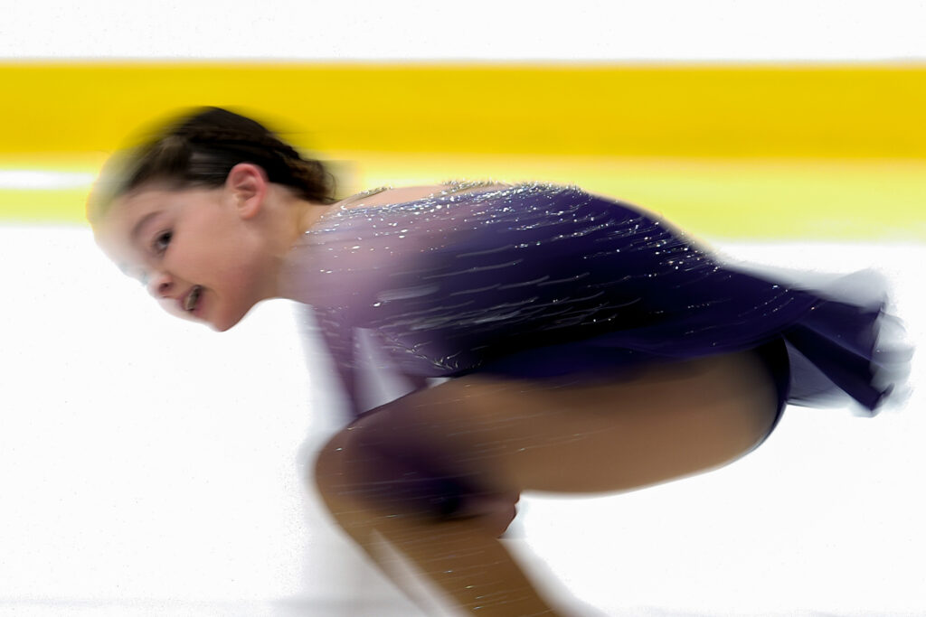 An athlete skating on the rink