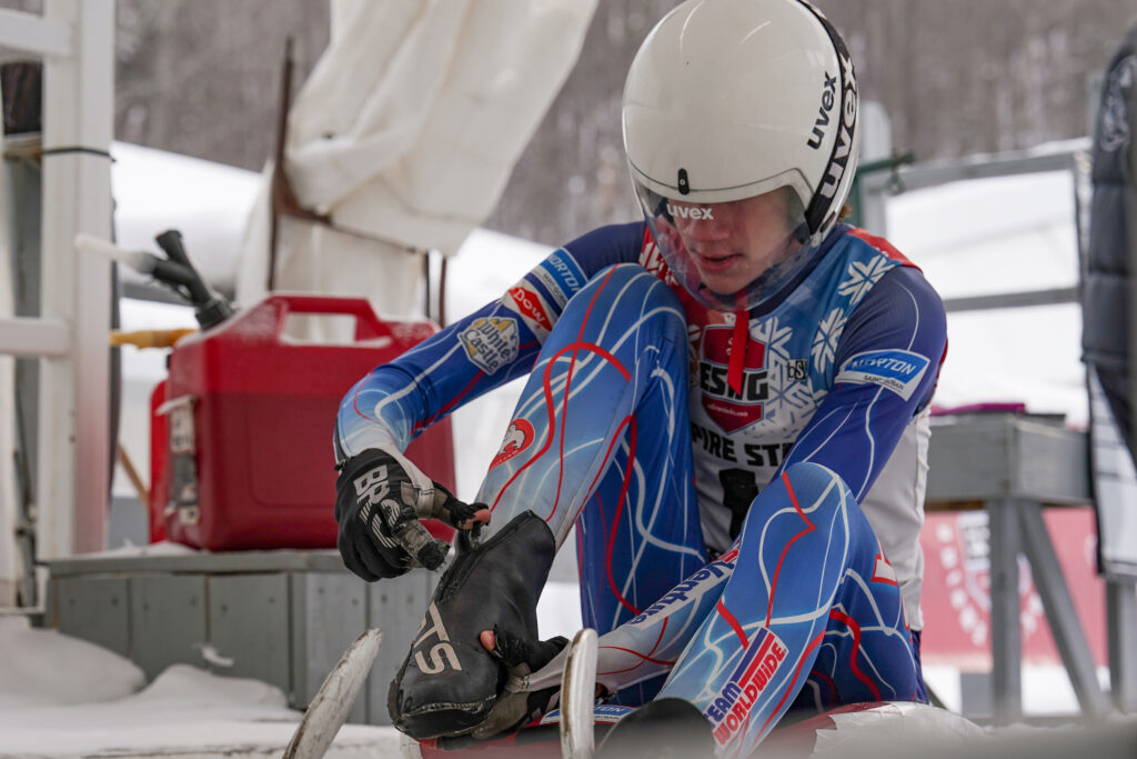 An athlete competing in athletic event sports with helmet