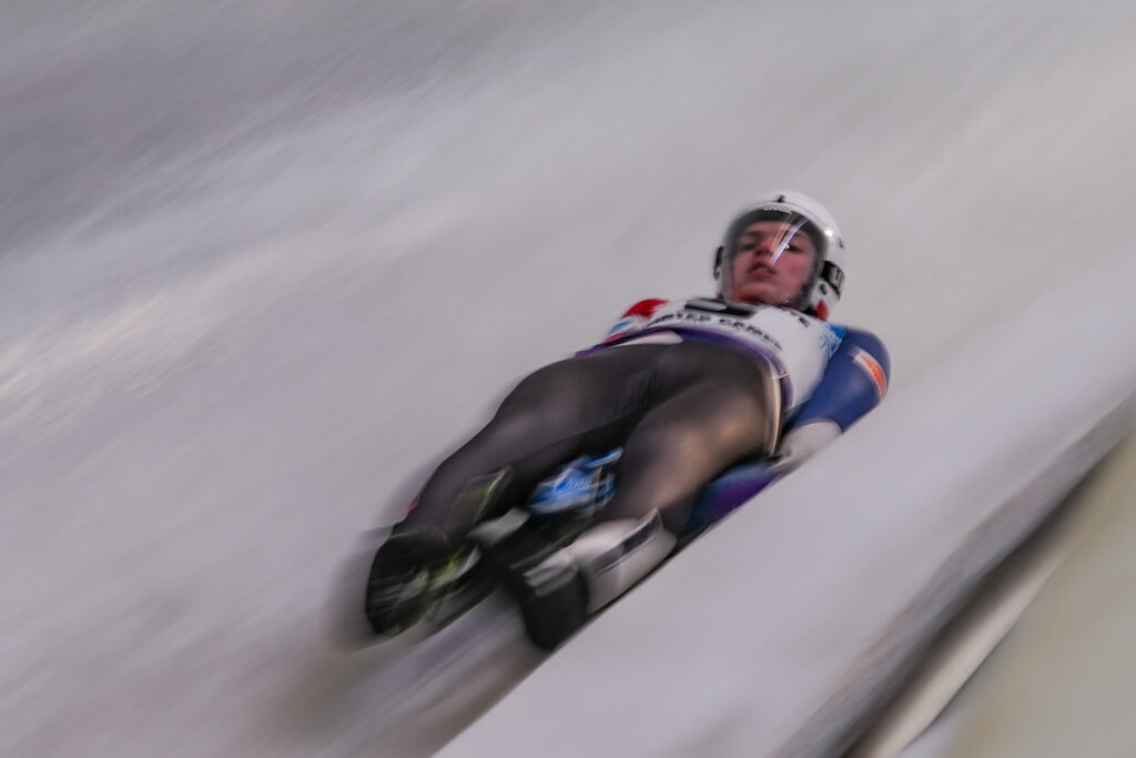 An athlete competing in athletic event sports with helmet
