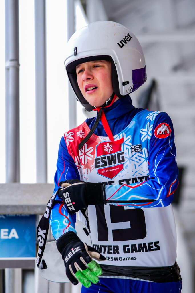 An athlete competing in athletic event sports with helmet