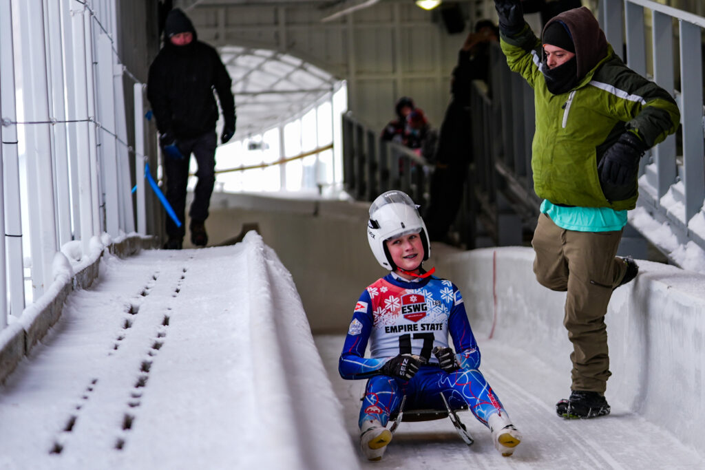 A group of athletes competing in athletic event sports with helmet