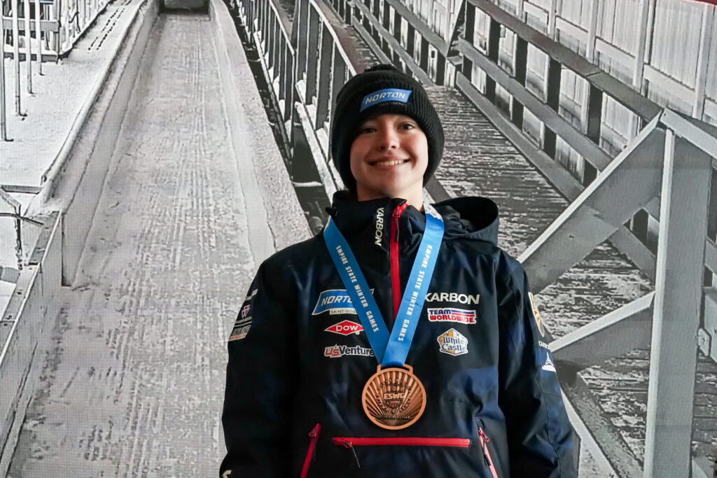 An athlete competing in athletic event sports