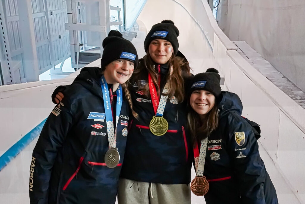 A group of athletes competing in athletic event sports