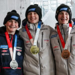 A group of athletes competing in athletic event sports