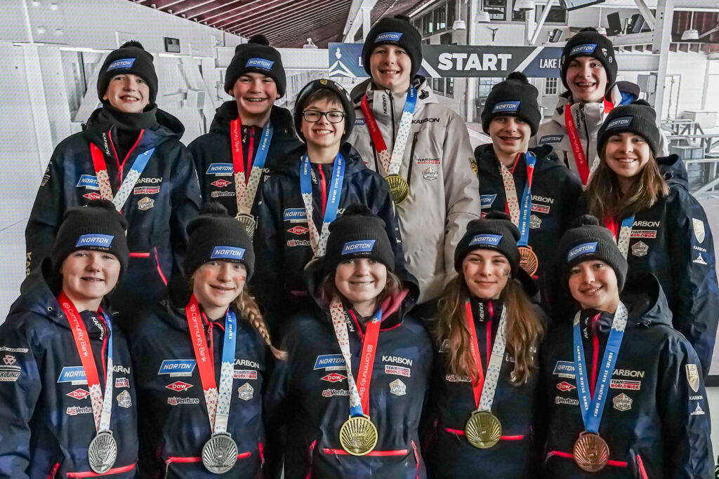 A group of athletes competing in athletic event sports