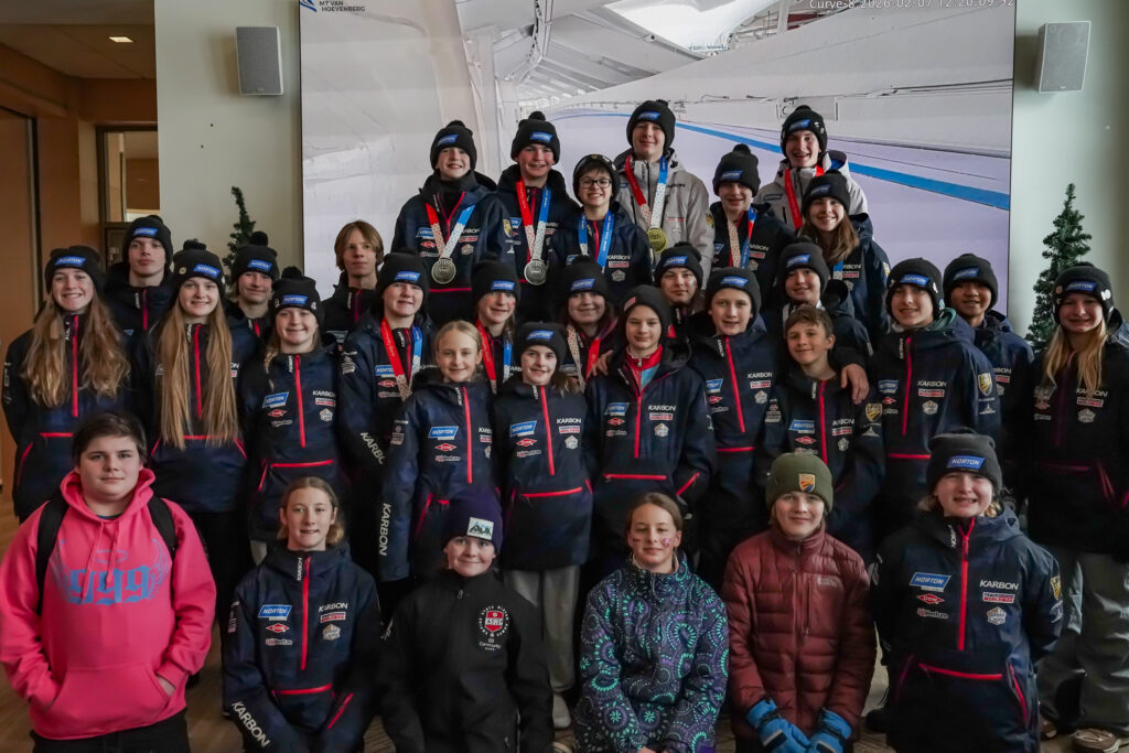 A group of athletes competing in athletic event sports with helmet