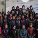 A group of athletes competing in athletic event sports with helmet