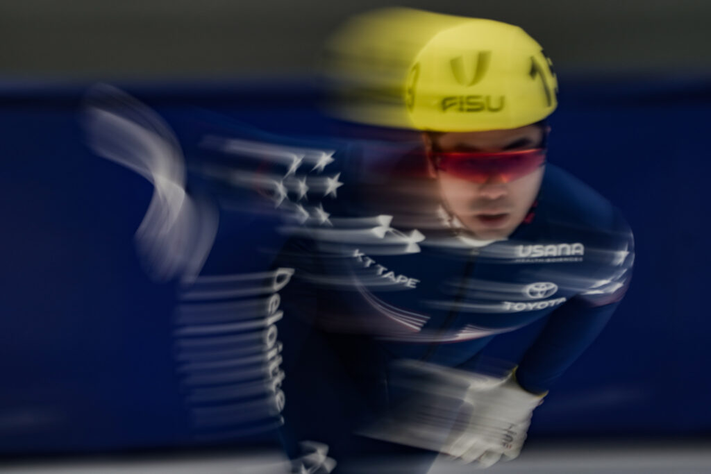 An athlete competing in athletic event sports with helmet