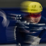 An athlete competing in athletic event sports with helmet